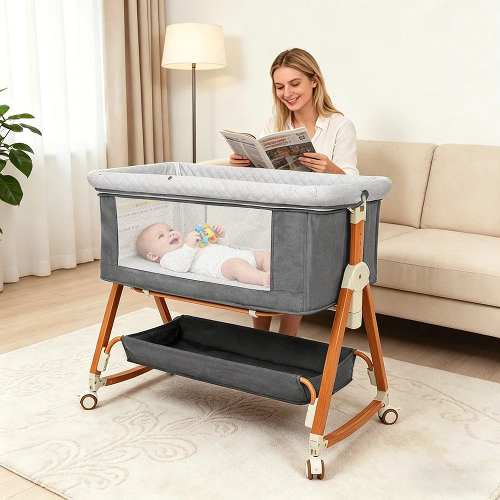 Heavy‑Duty Bedside Baby Bassinet Sleeper Kmaier  Grey Minimalist Co‑Sleeper Crib with Large Storage Bin, Height Adjustable Wooden‑Grain Frame, Breathable Mesh Safe Rocking Bassinet for Newborn Boy Girl