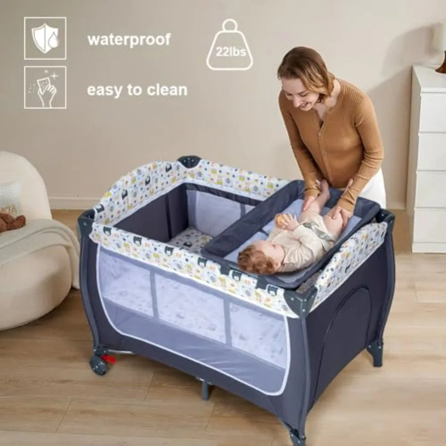 4 in 1 Portable Nursery Center Playard with Bassinet Changing Table Foldable Baby Crib Travel Playpen with Wheels Removable Can