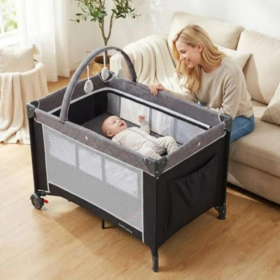 3 in 1 Pack and Play Travel Crib Bassinet Bed for Baby with Changing Table Safety Belt Toy Bar Lockable Wheels Portable Baby P